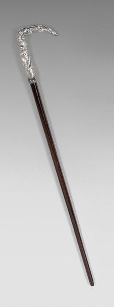 null Silver cane with pommel featuring a demon watching Adam and Eve.
Circa 1900...