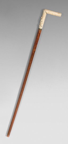 null Cane with a bone pommel carved from a mountaineer.