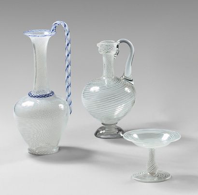 null Ewer in crystal (Baccarat?) with white latticini decoration and blue threads;...