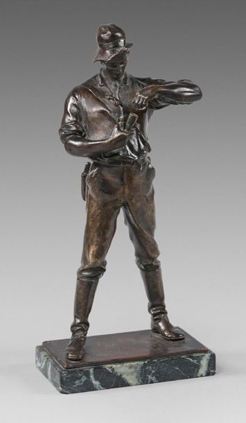 M. MULLER Fisherman stuffing his pipe Bronze
statuette with medal patina, signed...
