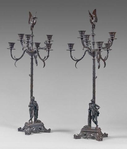 null Pair of "Etruscan" candelabra in patinated bronze with six leafy arms of light,...