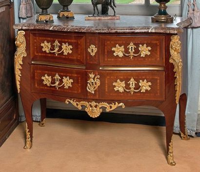 null Satin veneer chest of drawers with curved fronts and sides, opening with three...