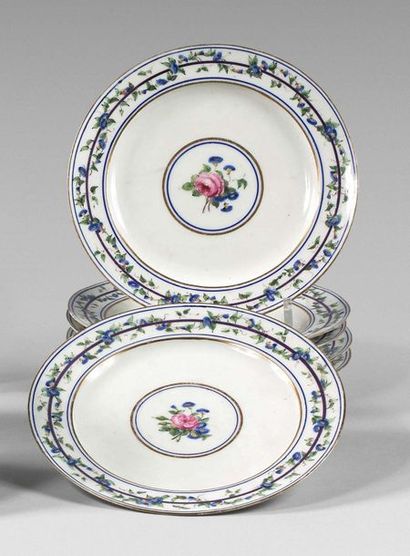 SEVRES (pâte tendre) 
Six plates with polychrome decoration of roses in the center,...