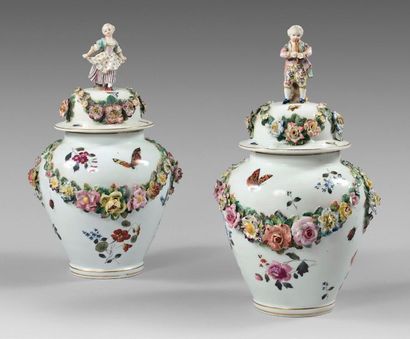 Allemagne Pair of covered vases with polychrome decoration of garlands of flowers...