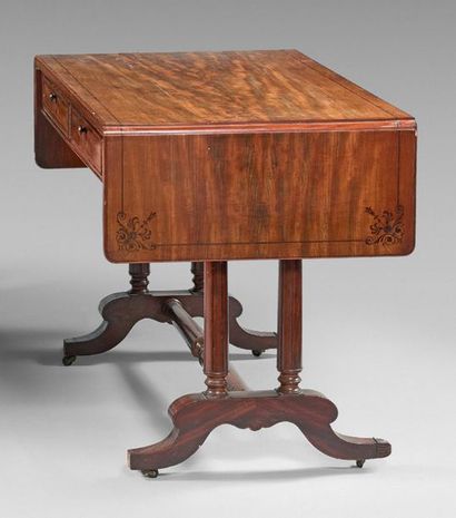 null Mahogany flap desk inlaid with black wood fillets and palmettes, opening with...