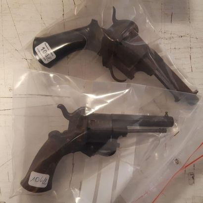 null Two pinfire revolvers Lefaucheux system, six shots, calibre 7 mm. Folding triggers.
In...