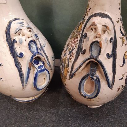 null Pair of flat ovoid gourds in polychrome earthenware decorated with characters...