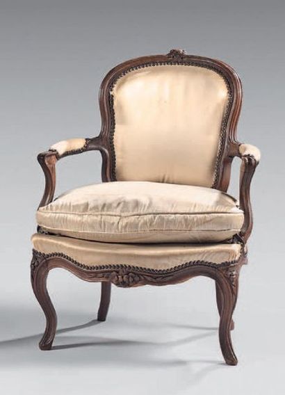 Convertible armchair in walnut carved with...