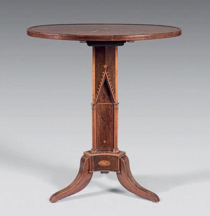  Rosewood pedestal table with tilting top inlaid with a radiating light wood pattern....