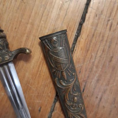 null Small belt or desk dagger in the style
Renaissance. Carved handle representing...