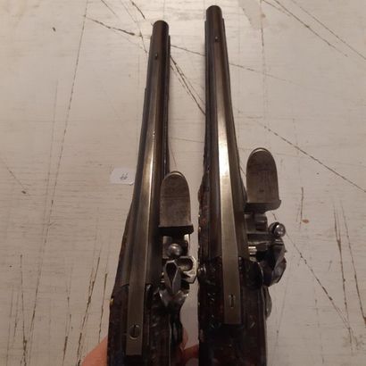 null Pair of officer's flintlock pistols.
Round barrels with flat flats on top and...