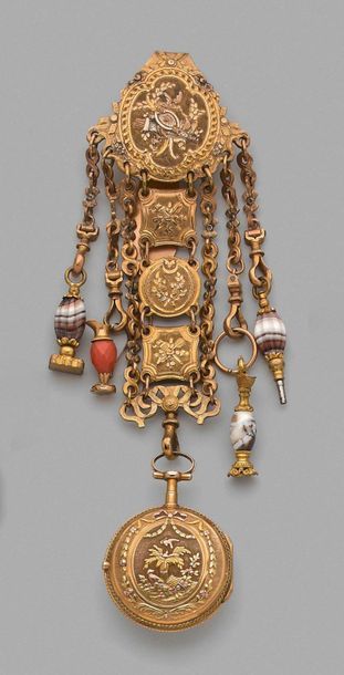 null Pomponne chain made up of four falling medallions decorated with music trophies,...