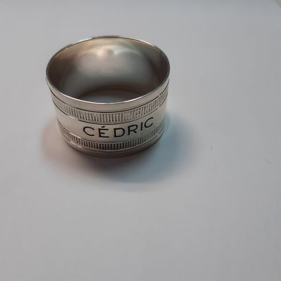 null Silver napkin ring 925 thousandths with decoration of godrons engraved "Cédric".
Goldsmith...