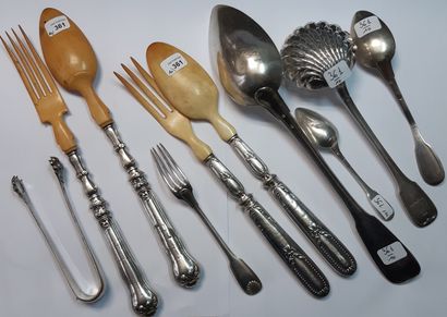 null Lot in silver 950 thousandths including: two salad servers, the tops in ivory;...