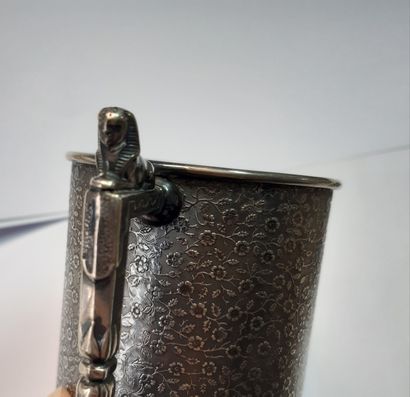 null Lot in silver 800 and 950 thousandths including: a mug with decoration of semi...