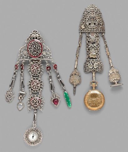 null Set of three chatelaines, two of which are silver, one with an openwork trophy...