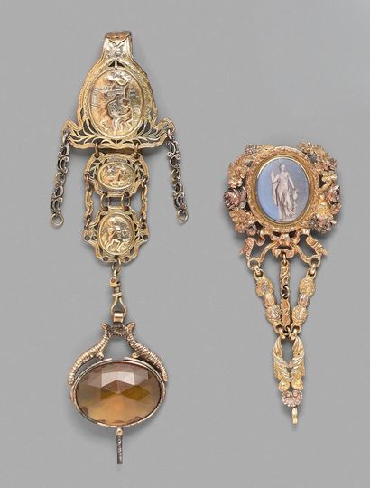 Two pompom chatelaines, one set with an enamelled...
