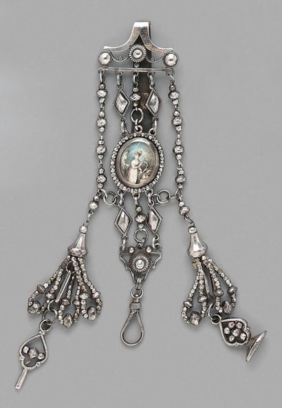 null Set of four openwork steel chatelaines, two of which are decorated with polychrome...