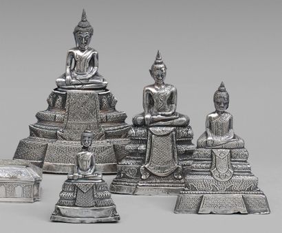 null Suite of four silver Buddha statuettes.
Thailand.
(Damage to the head of the...