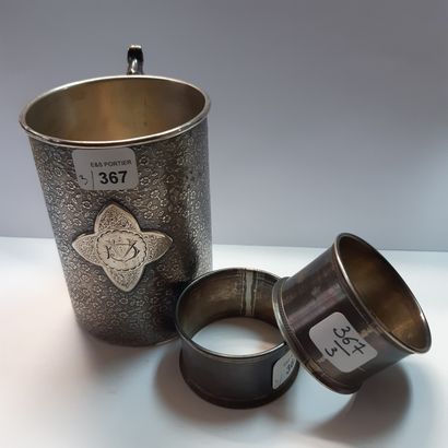 null Lot in silver 800 and 950 thousandths including: a mug with decoration of semi...