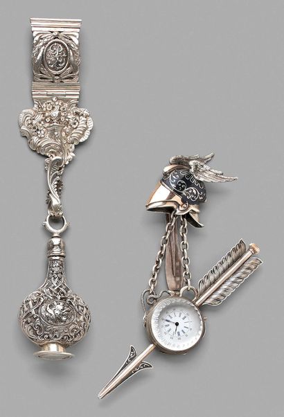 Two silver chatelaines, one decorated with...