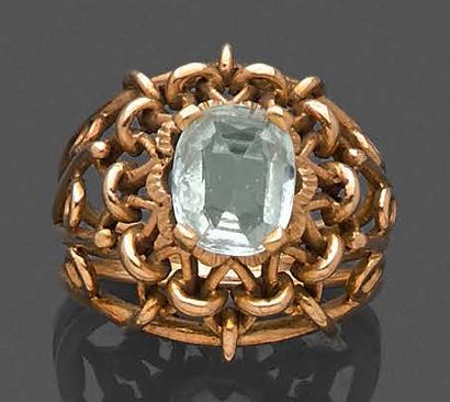 null Lot in yellow gold 750 thousandths comprising: a ring dome openwork decorated...