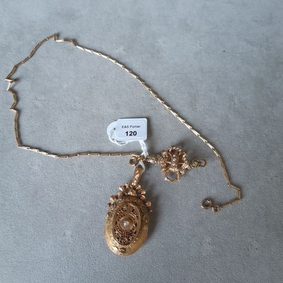 null Lot in gold 750 thousandths including: a necklace; a scarf-band decorated with...