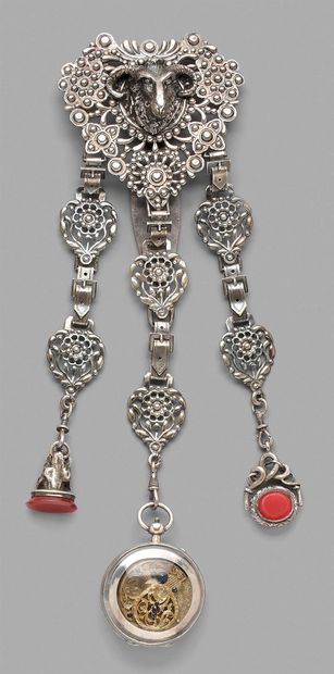 null Silver chatelaine partially openworked decorated in relief with a ram's head,...