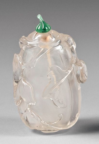 CHINE - XIXe siècle 
Snuff bottle in the shape of a lemon digitate in sculpted rock...