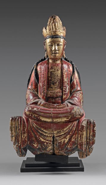 VIETNAM - XVIIIe/XIXe siècle 
Statuette en bois sculpté laqué rouge, brun et or de...