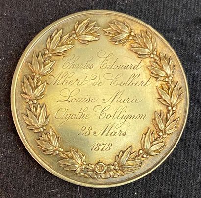 null Colbert wedding medal in vermeil struck on both sides of a laurel wreath in...