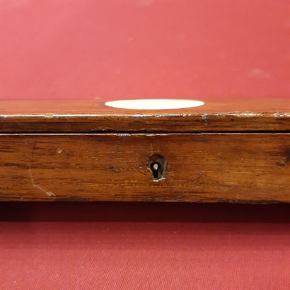 null Mahogany case containing a dismountable three-part turned ivory rod.
Silver...