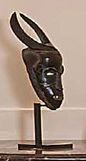 null Gouro mask, Ivory Coast.
Wood with dark brown to black patina.
(Accidents)....