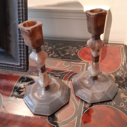 null A pair of small agate torches with a baluster shaft, on an octagonal base.
Silver...