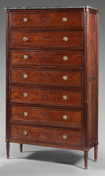 null Mahogany veneered weekly cabinet opening to seven drawers.
Fluted mounts, the...
