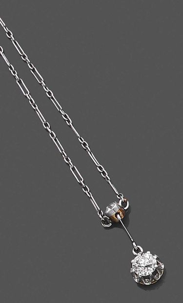 null Articulated necklace in platinum 850 thousandths supporting in pendant an old...