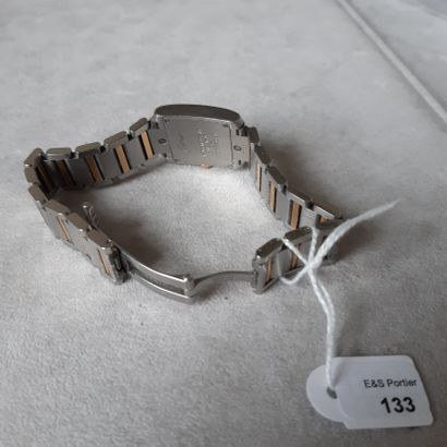 Cartier, Tank Française 
Montre bracelet de dame en acier et or 18k (750 millièmes)....