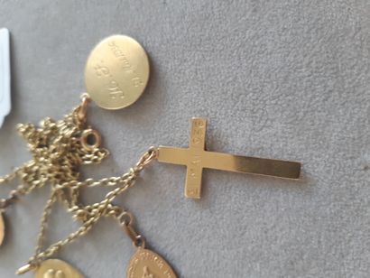 null Articulated necklace in yellow gold 750 thousandths supporting a cross and two...