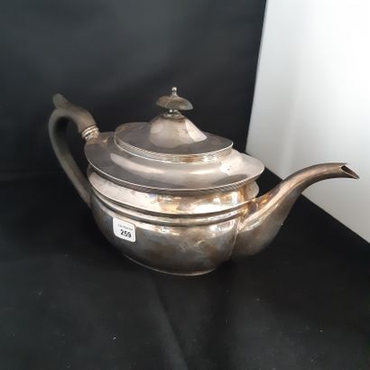 null Silver teapot 925 thousandth of oval form underlined by mouldings, the handle...