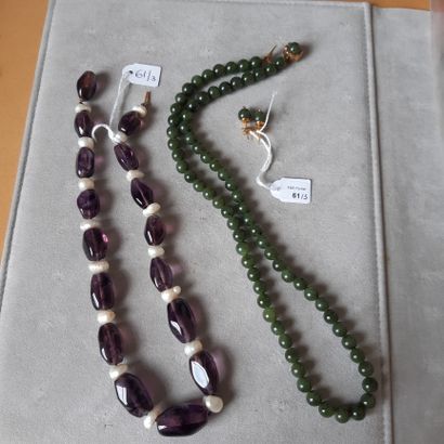 null Lot including: two necklaces in various hard stones (jade), amethysts and articulated...