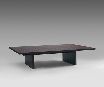 TRAVAIL ÉTRANGER Shaped coffee table, exotic wood top resting on a double base.
Height:...