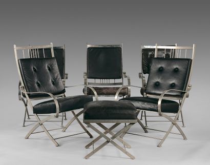 Attribué à Jansen Suite of five armchairs and a stool, chromed metal structure, black...