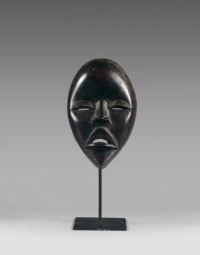 null Dan entertainment mask, Ivory Coast
Wood with a dark brown and black patina.
Height:...