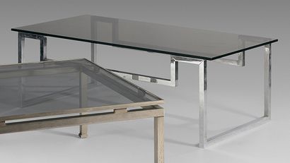 TRAVAIL DES ANNÉES 70 Table basse, structure en métal chromé, plateau en verre.
Hauteur:...