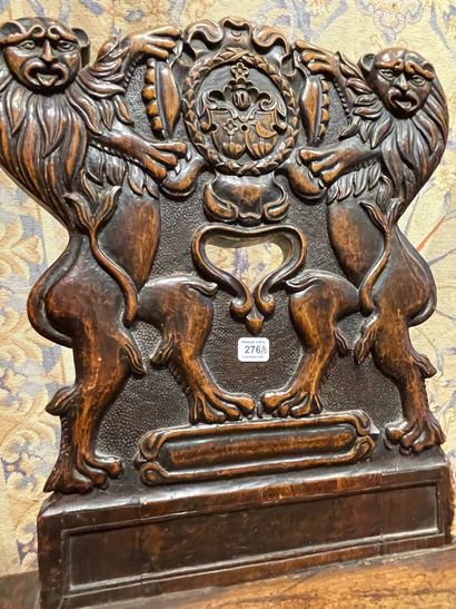 null Pair of walnut stool chairs. Moulded backrest carved in high relief with two...