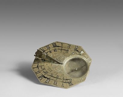 null Brass pocket sundial engraved with three hour circles, signed Le Fèbvre A Paris...