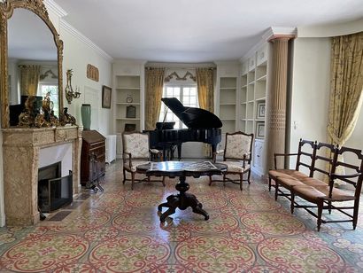 null Oak pedestal table with a poly-lobed top decorated with a checkerboard of inlaid...