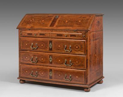 null Scriban chest of drawers with inlaid scrolls and geometrical motifs opening...