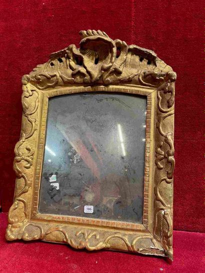 null 
Miroir en bois et stuc doré. Style Louis XV
