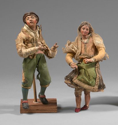 null Couple of peasants in polychrome terracotta.
Height : 21 cm